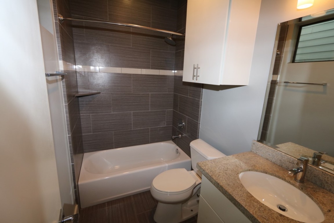 2103 Hadley Street Houston, TX 77003 - Photo 17 of 19 a bathroom with a sink toilet and shower