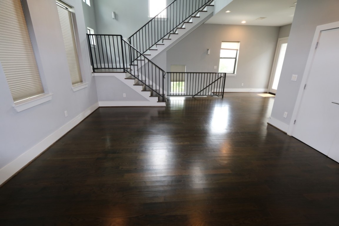 2103 Hadley Street Houston, TX 77003 - Photo 6 of 19 a view of entryway and hall with wooden floor