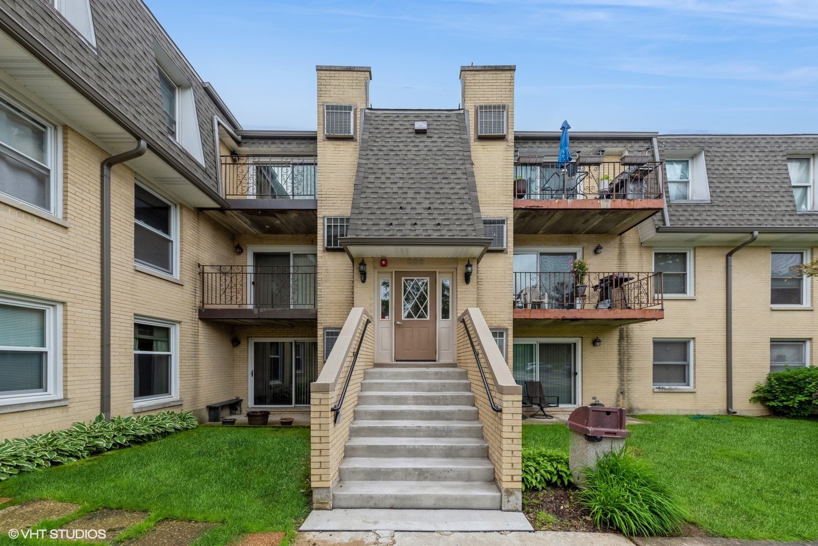 806 North River Road, Unit 3A Mount Prospect, IL 60056 - Photo 1 of 11 a front view of a residential apartment building with a yard