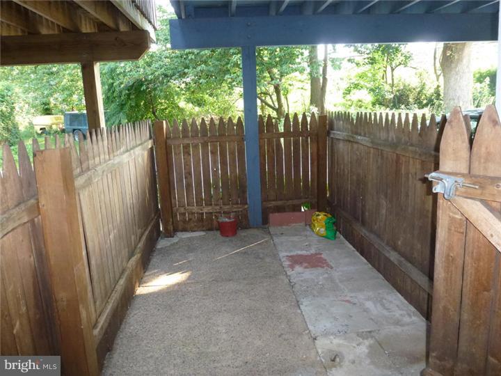 7028 Cresheim Road Philadelphia, PA 19119 - Photo 17 of 23 a view of backyard with tub and tree