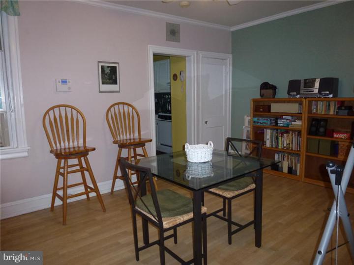7028 Cresheim Road Philadelphia, PA 19119 - Photo 8 of 23 a view of a livingroom with furniture and wooden floor