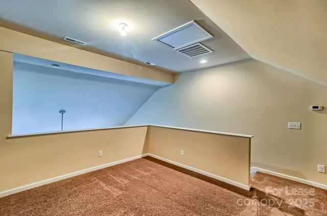 a view of a house with a snow on the wall