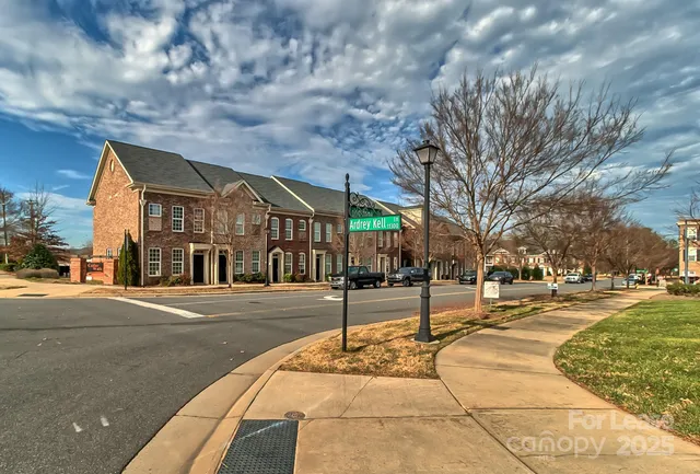 a view of a street with houses