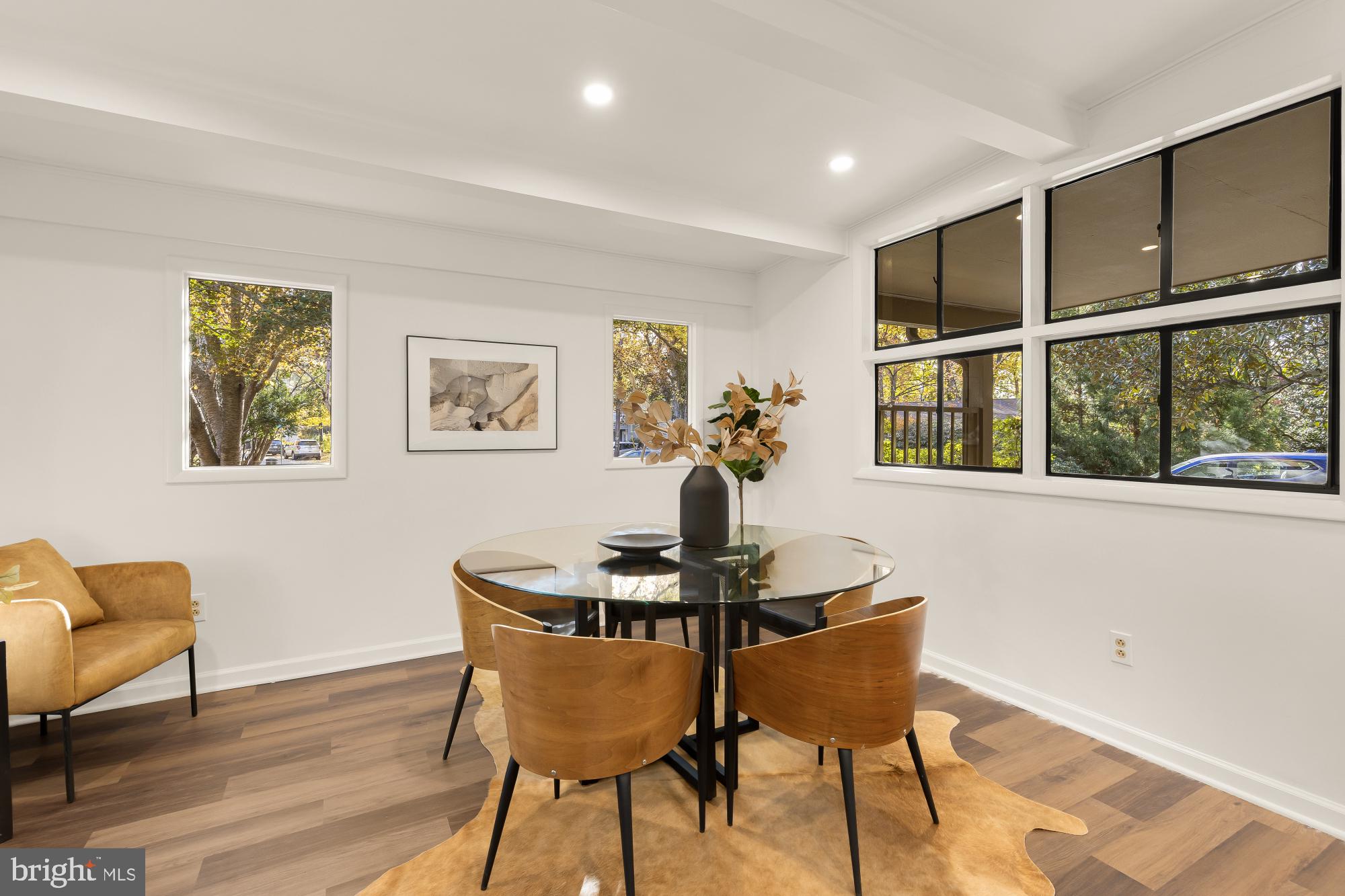 4911 Falstone Avenue Chevy Chase, MD 20815 - Photo 17 of 58 a dining room with furniture and window