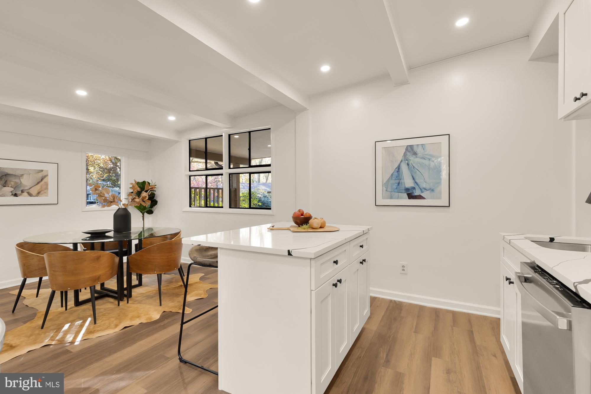 4911 Falstone Avenue Chevy Chase, MD 20815 - Photo 22 of 58 a view of a workspace room with wooden floor and furniture