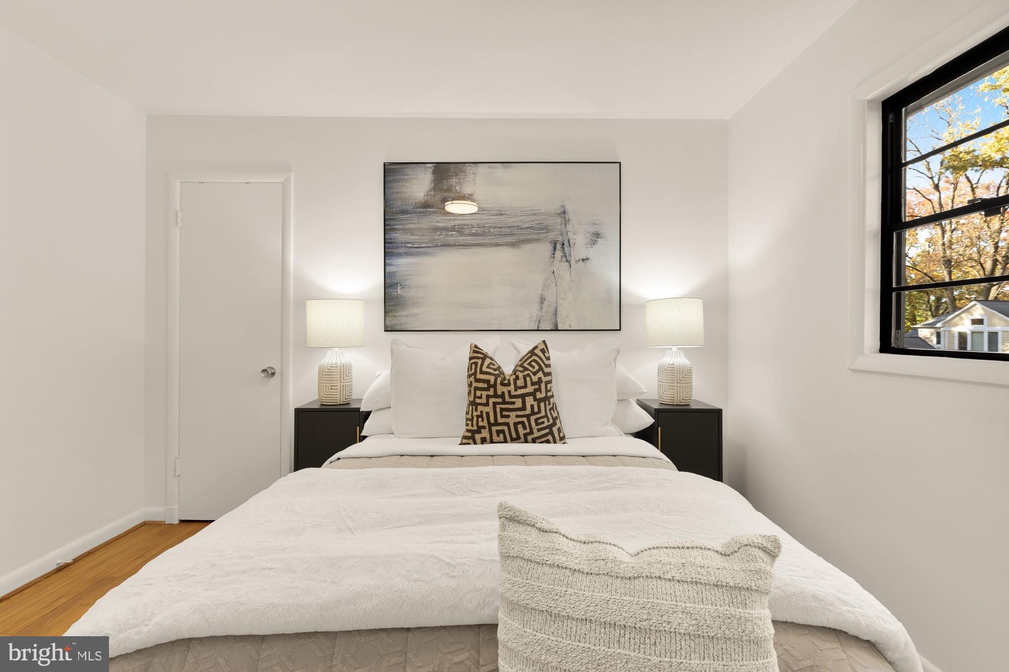 4911 Falstone Avenue Chevy Chase, MD 20815 - Photo 30 of 58 a bedroom with a bed and a window