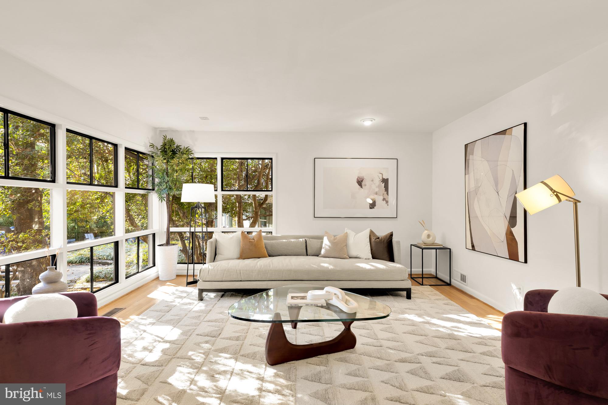 4911 Falstone Avenue Chevy Chase, MD 20815 - Photo 6 of 58 a living room with furniture and a large window