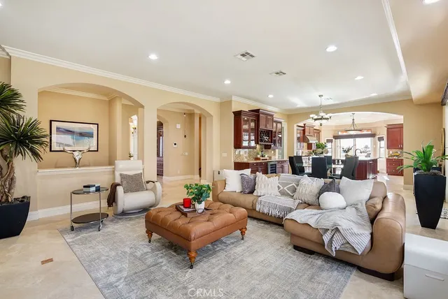 a living room with furniture and a table