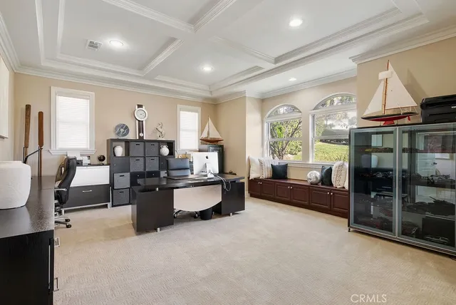 a living room with furniture window and flat screen tv