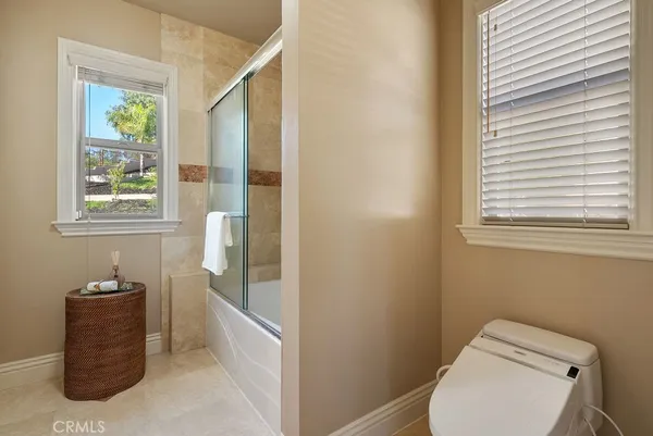 a bathroom with a toilet and a sink