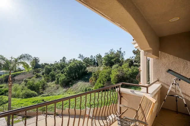 a view of a two chair in the balcony