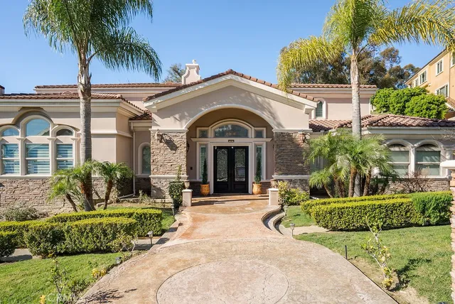a view of a house with a swimming pool