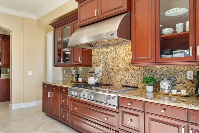 a kitchen with granite countertop lots of counter top space