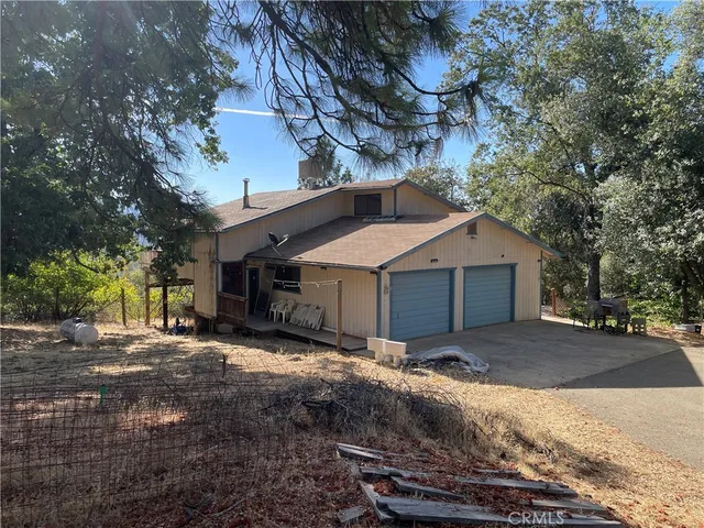 a house view with a outdoor space