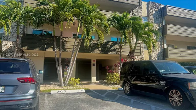 a car parked in front of a house