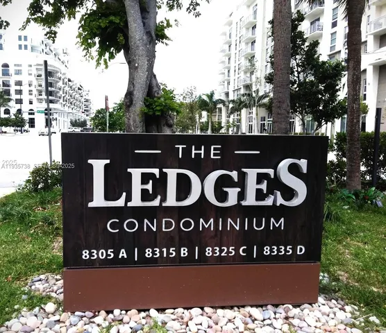 a sign broad on the side of the road