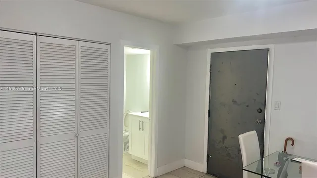 a view of a room with windows