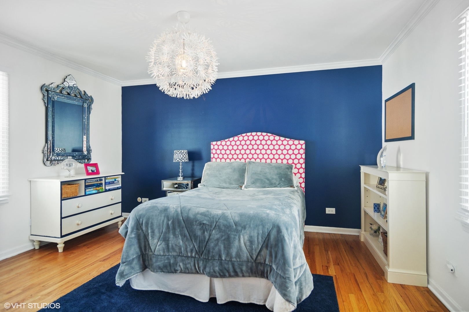 1333 West Deerpath Road Lake Forest, IL 60045 - Photo 12 of 22 a bedroom with a bed and wooden floor