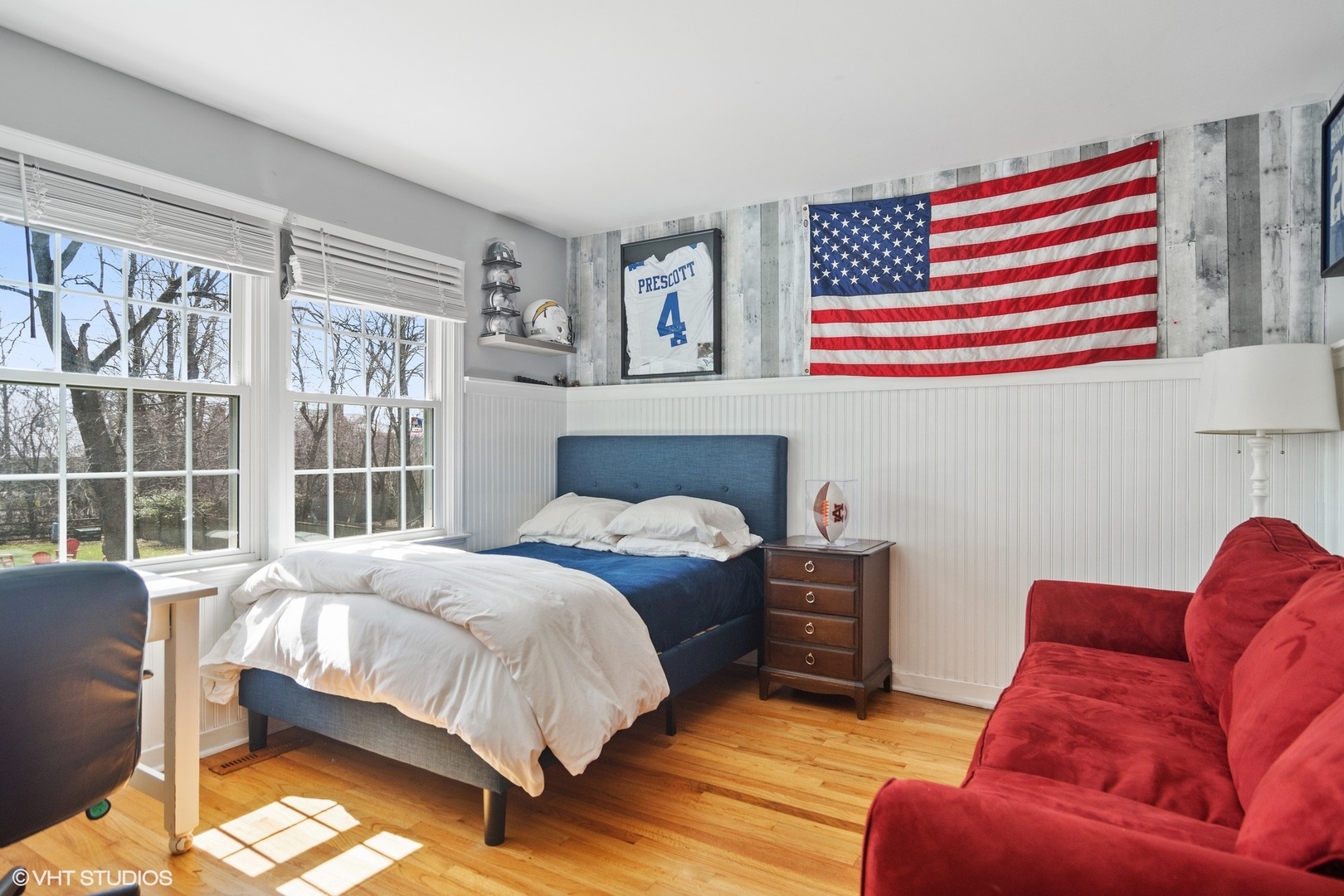 1333 West Deerpath Road Lake Forest, IL 60045 - Photo 13 of 22 a bedroom with a bed couch and a window