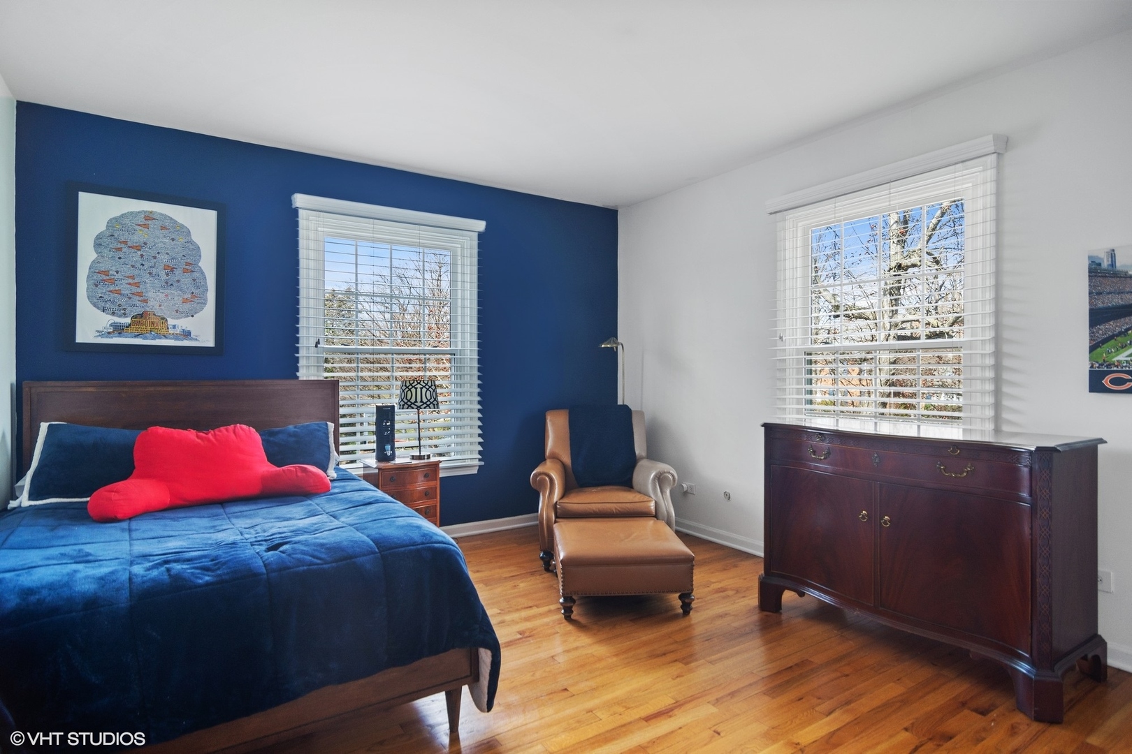 1333 West Deerpath Road Lake Forest, IL 60045 - Photo 14 of 22 a bedroom with a bed and wooden floor