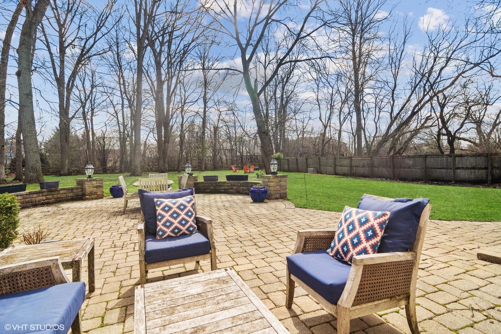 1333 West Deerpath Road Lake Forest, IL 60045 - Photo 16 of 22 a view of a patio with couches chairs and a yard