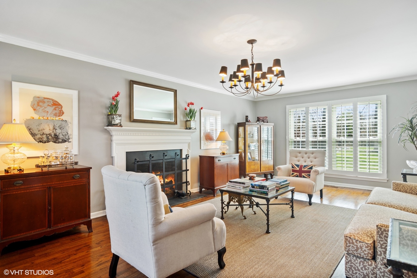 1333 West Deerpath Road Lake Forest, IL 60045 - Photo 3 of 22 a living room with furniture and a fireplace