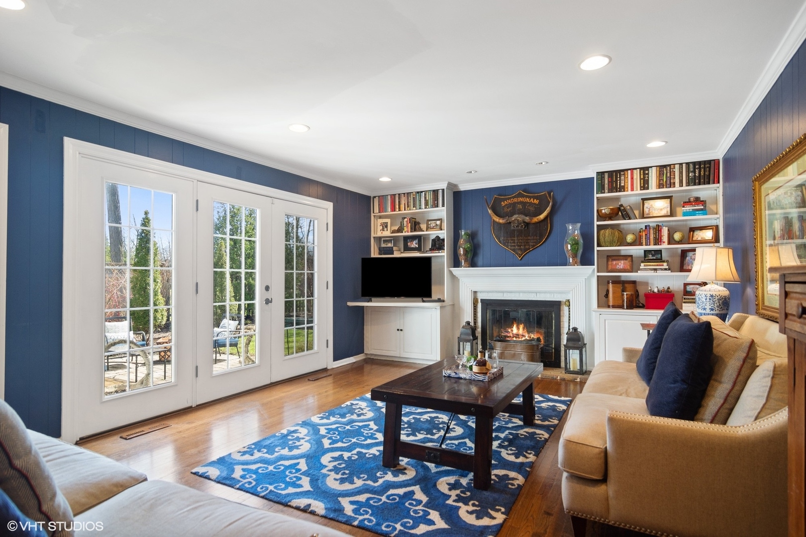 1333 West Deerpath Road Lake Forest, IL 60045 - Photo 7 of 22 a living room with furniture and a fireplace