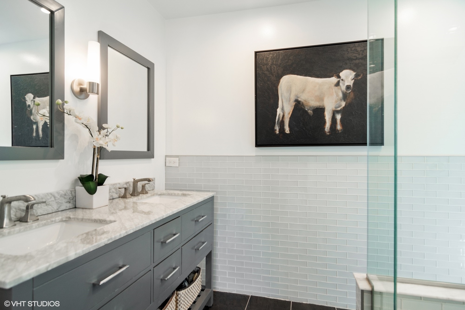 1333 West Deerpath Road Lake Forest, IL 60045 - Photo 10 of 22 a bathroom with a sink and a mirror