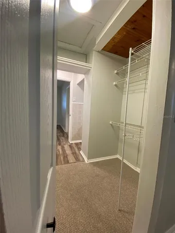 a bathroom with a shower and a sink