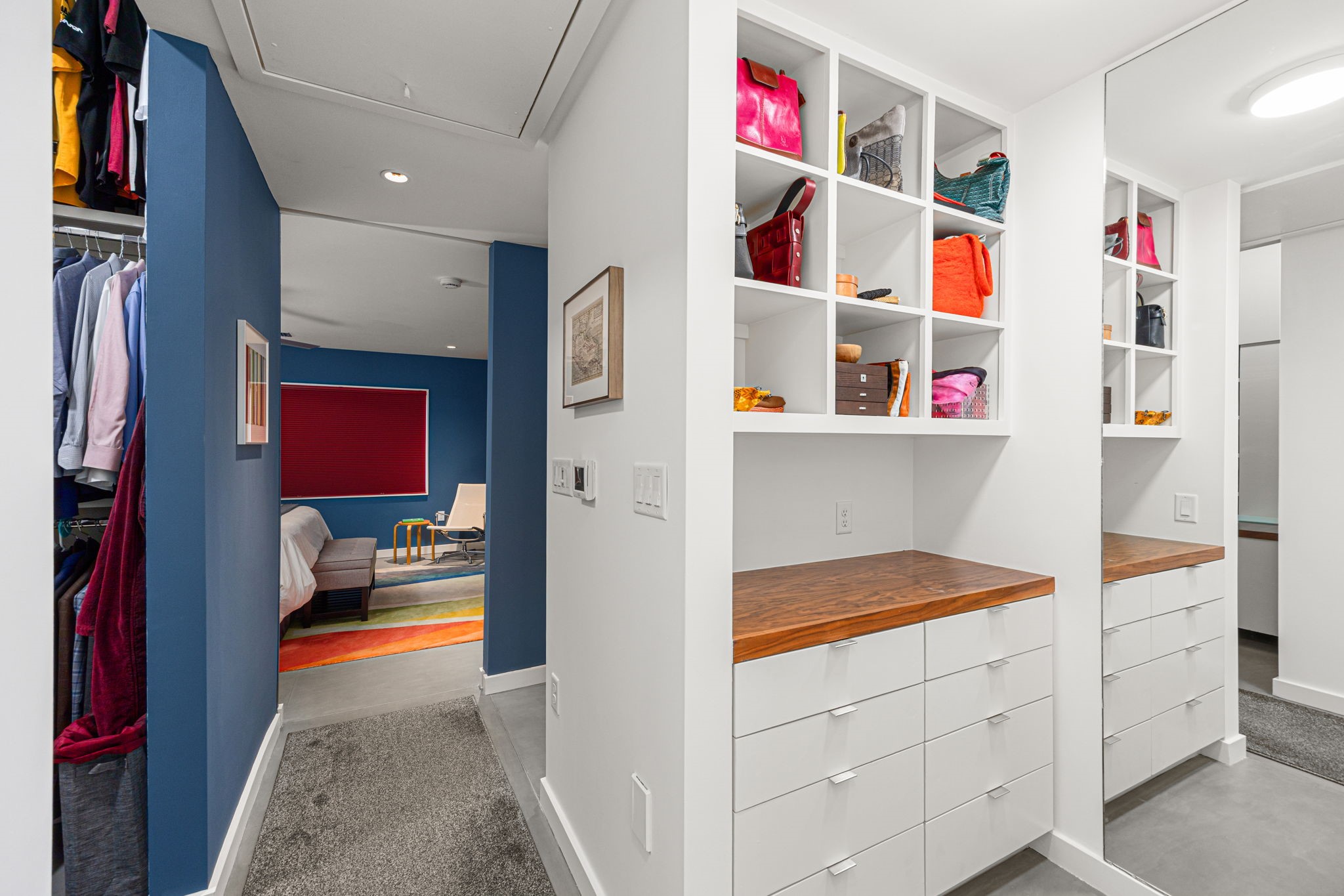5811 Rose Street Houston, TX 77007 - Photo 23 of 38 The dressing area adjacent to the primary closet offers additional drawer and cubby storage, full length mirror and creates the perfect makeup or morning prep zone.