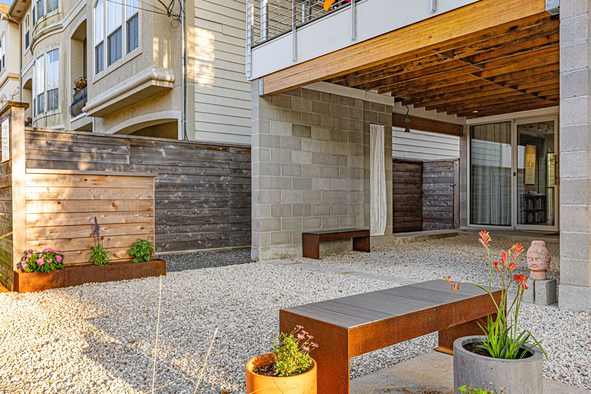 5811 Rose Street Houston, TX 77007 - Photo 35 of 38 The gravel and garden courtyard provides a unique outdoor space to relax after your jog to Memorial Park, or perfect your green thumb in the above ground planters. Additionally, this space can be used for shaded off-street parking.