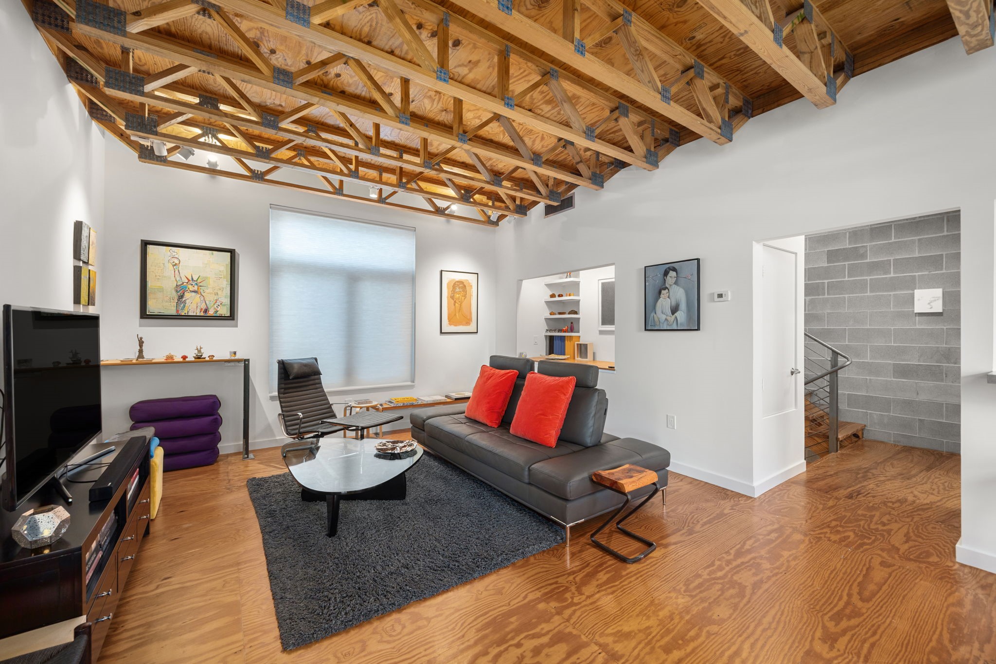 5811 Rose Street Houston, TX 77007 - Photo 9 of 38 The boldness of the natural wood elements, combined with the bright contrast of white walls offers a flexible backdrop for furniture and art.