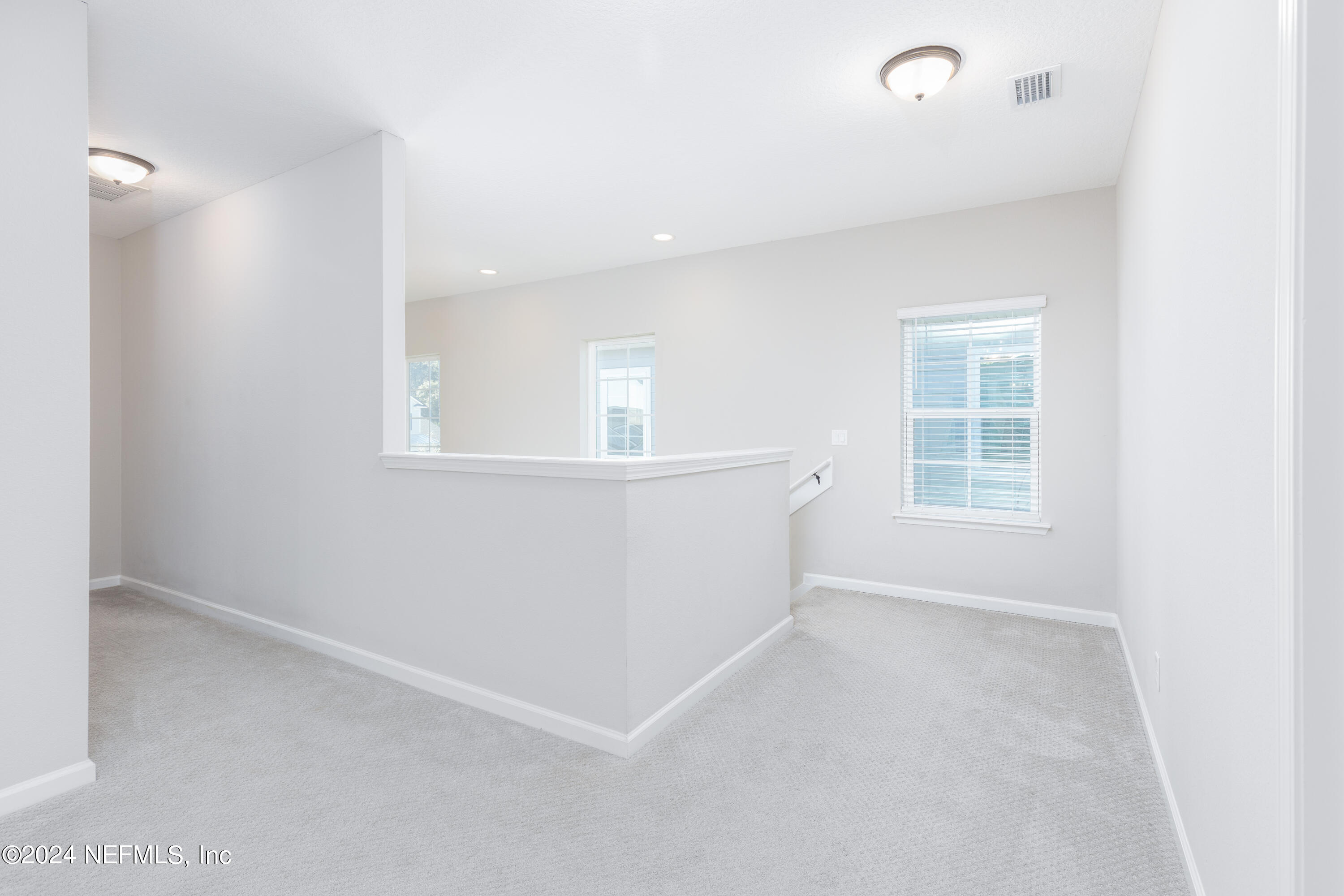 400 Weathered Edge Drive St. Augustine, FL 32092 - Photo 28 of 35 an empty room with windows