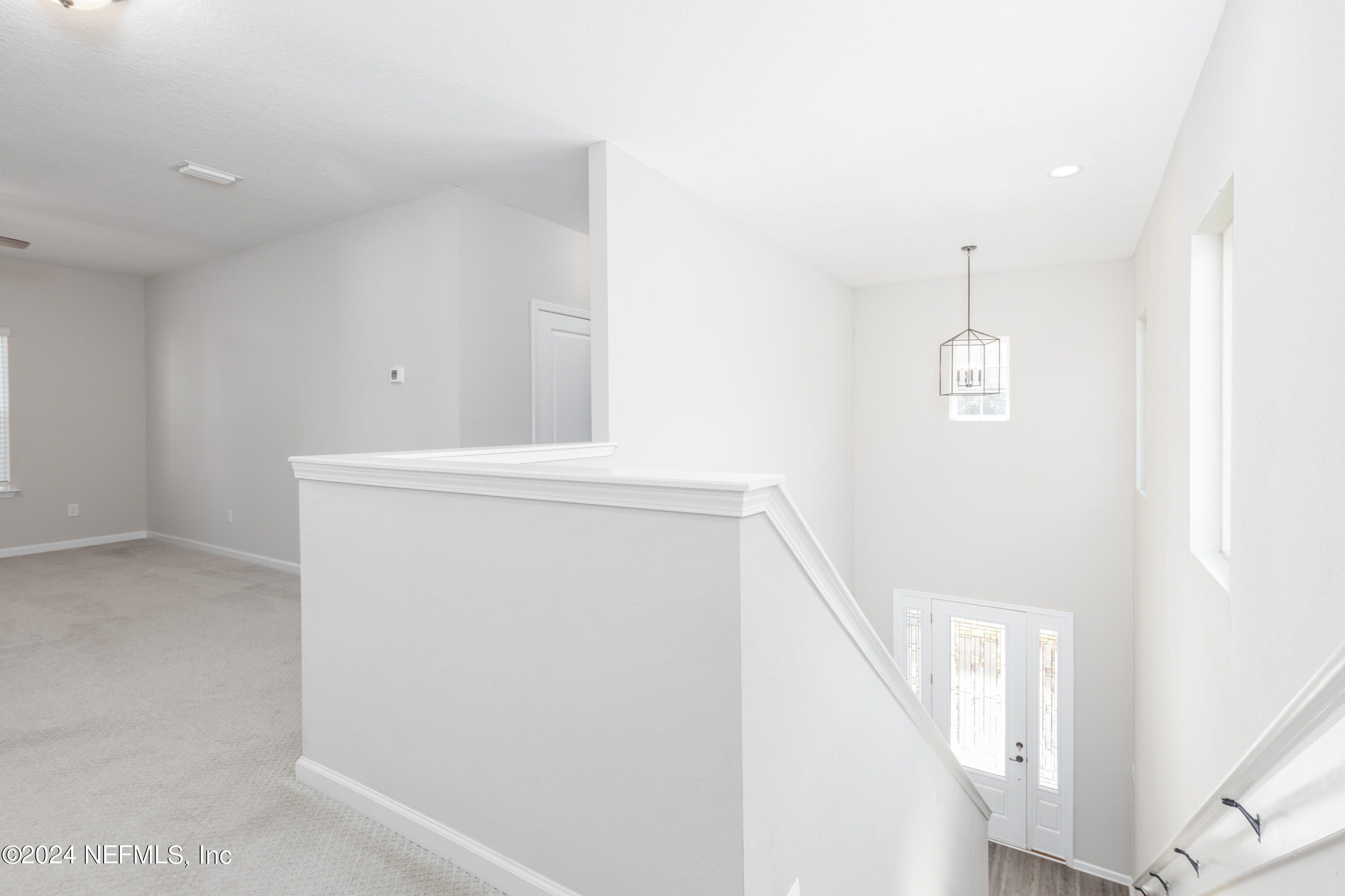 400 Weathered Edge Drive St. Augustine, FL 32092 - Photo 29 of 35 a view of hallway with stairs