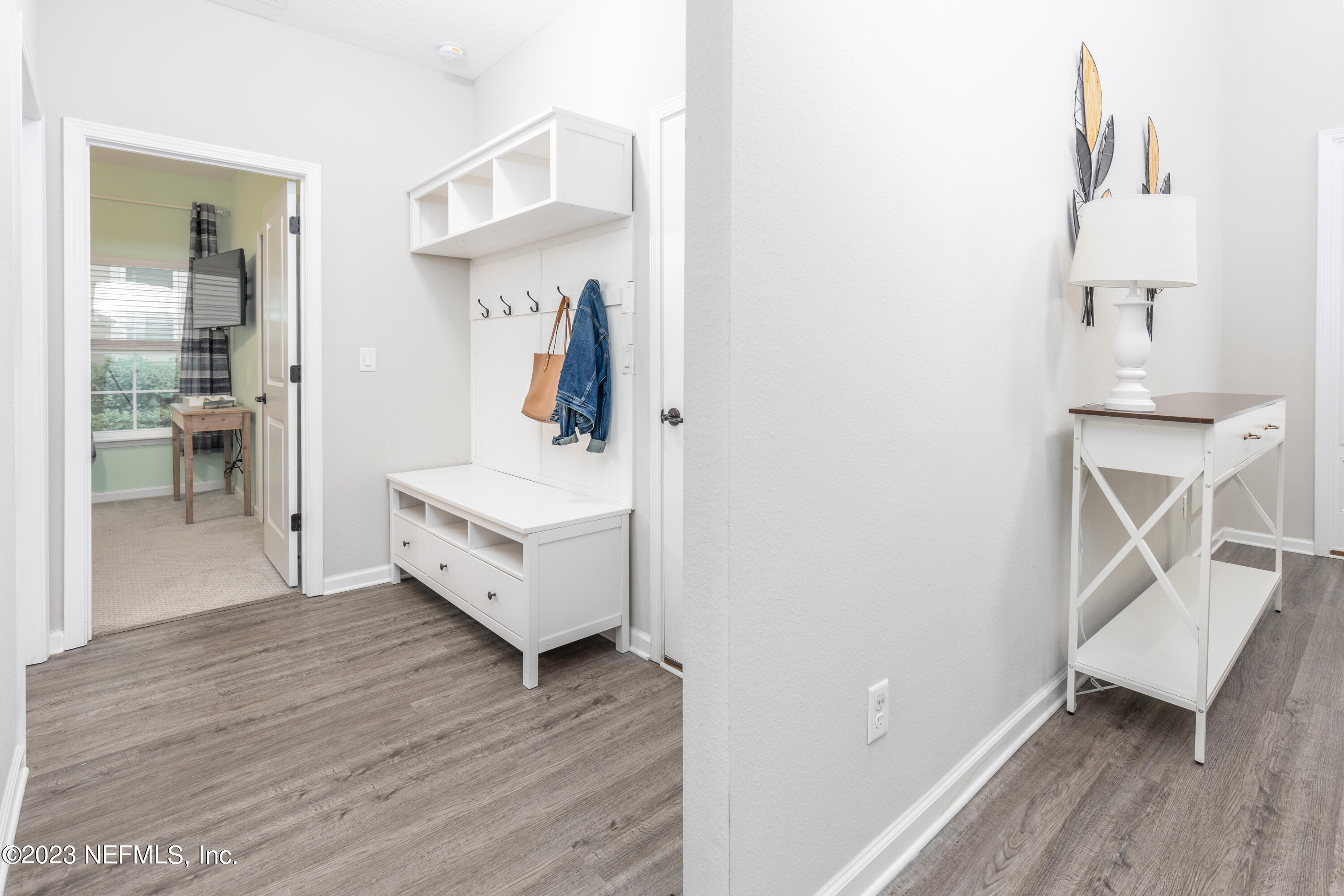 400 Weathered Edge Drive St. Augustine, FL 32092 - Photo 6 of 35 a view of living room with furniture and wooden floor