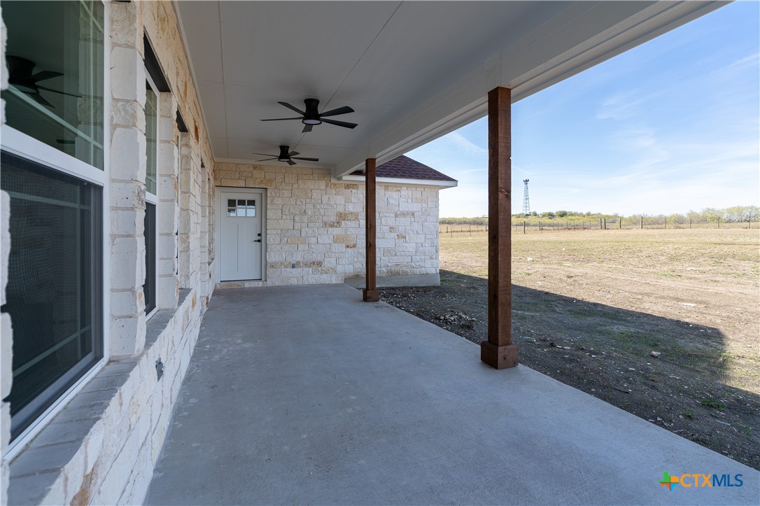 1000 Black Ankle Road Lockhart, TX 78644 - Photo 38 of 40 a view of a room with an empty space and floor to ceiling window