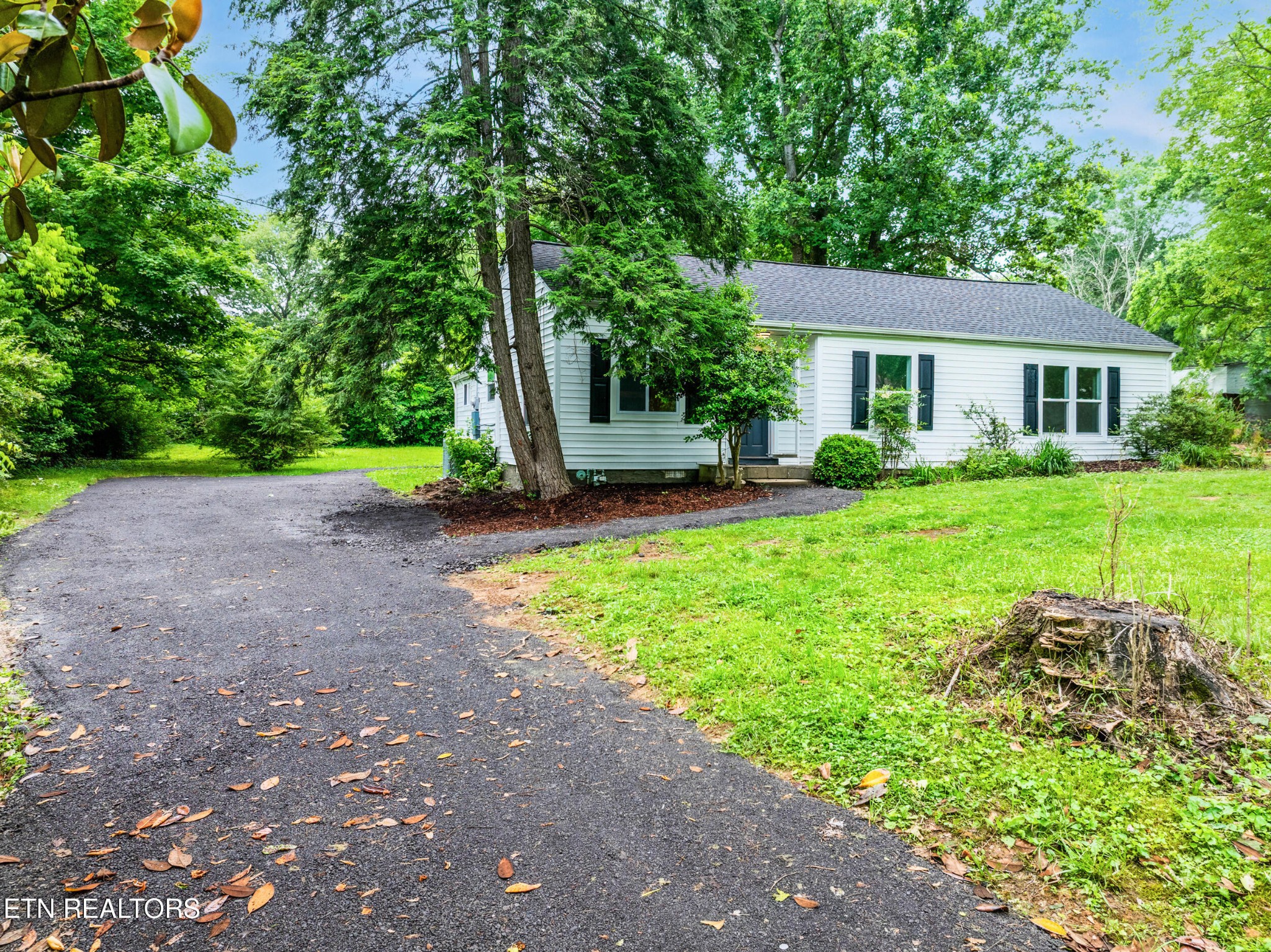 207 Shipe Road Powell, TN 37849 - Photo 2 of 23 a view of a house with a yard