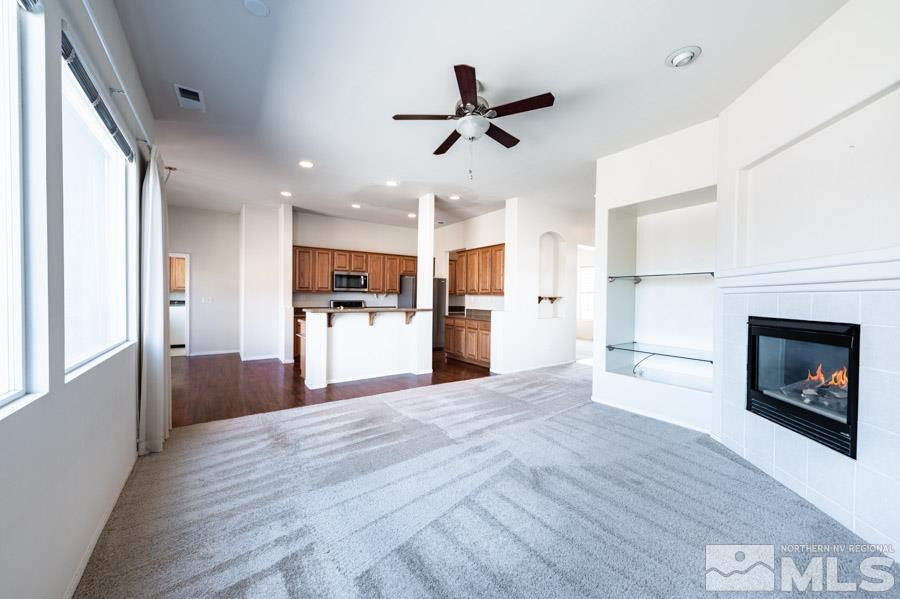 1487 Wild Wolf Way Reno, NV 89521 - Photo 12 of 39 a view of a kitchen with a sink and a kitchen