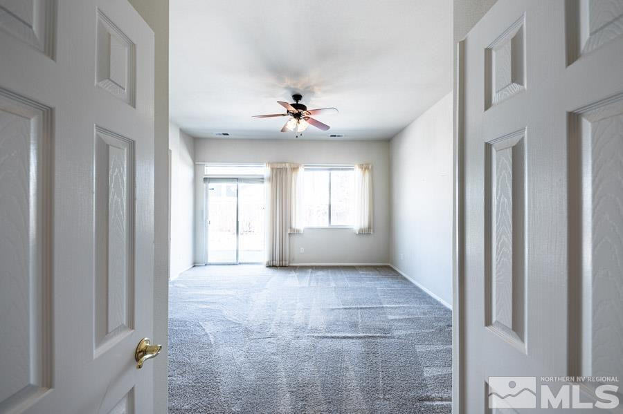 1487 Wild Wolf Way Reno, NV 89521 - Photo 22 of 39 a view of an empty room with a window