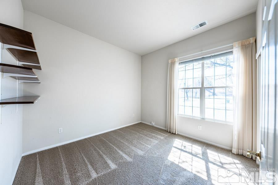 1487 Wild Wolf Way Reno, NV 89521 - Photo 28 of 39 a view of an empty room and window
