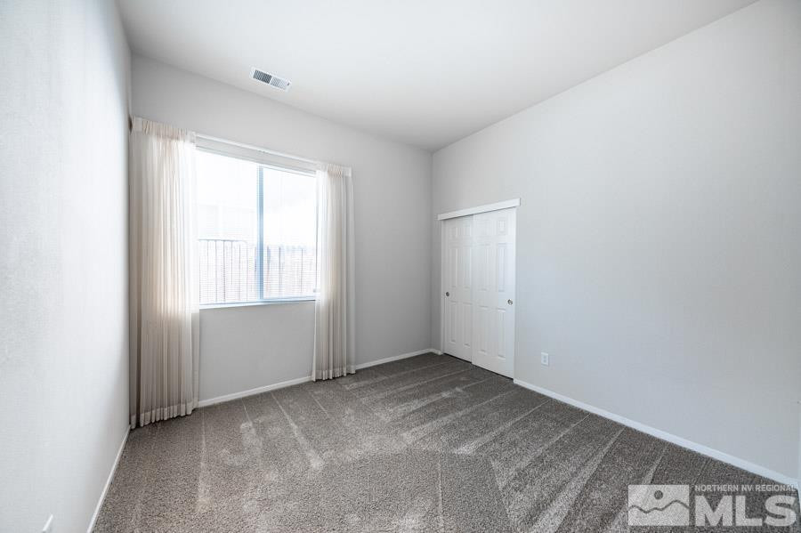 1487 Wild Wolf Way Reno, NV 89521 - Photo 30 of 39 a view of room with window