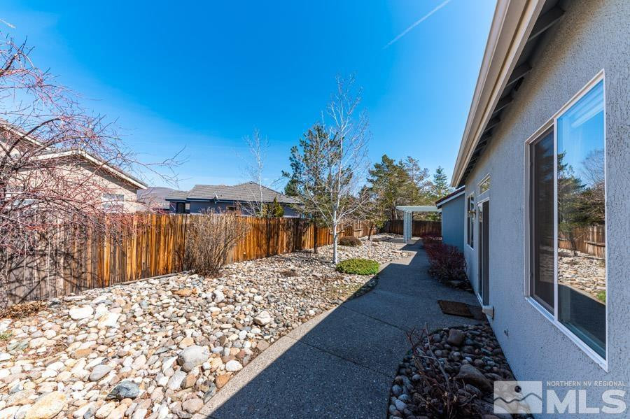 1487 Wild Wolf Way Reno, NV 89521 - Photo 34 of 39 a view of entryway with a yard