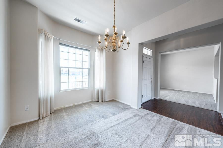1487 Wild Wolf Way Reno, NV 89521 - Photo 8 of 39 a view of an empty room with a window