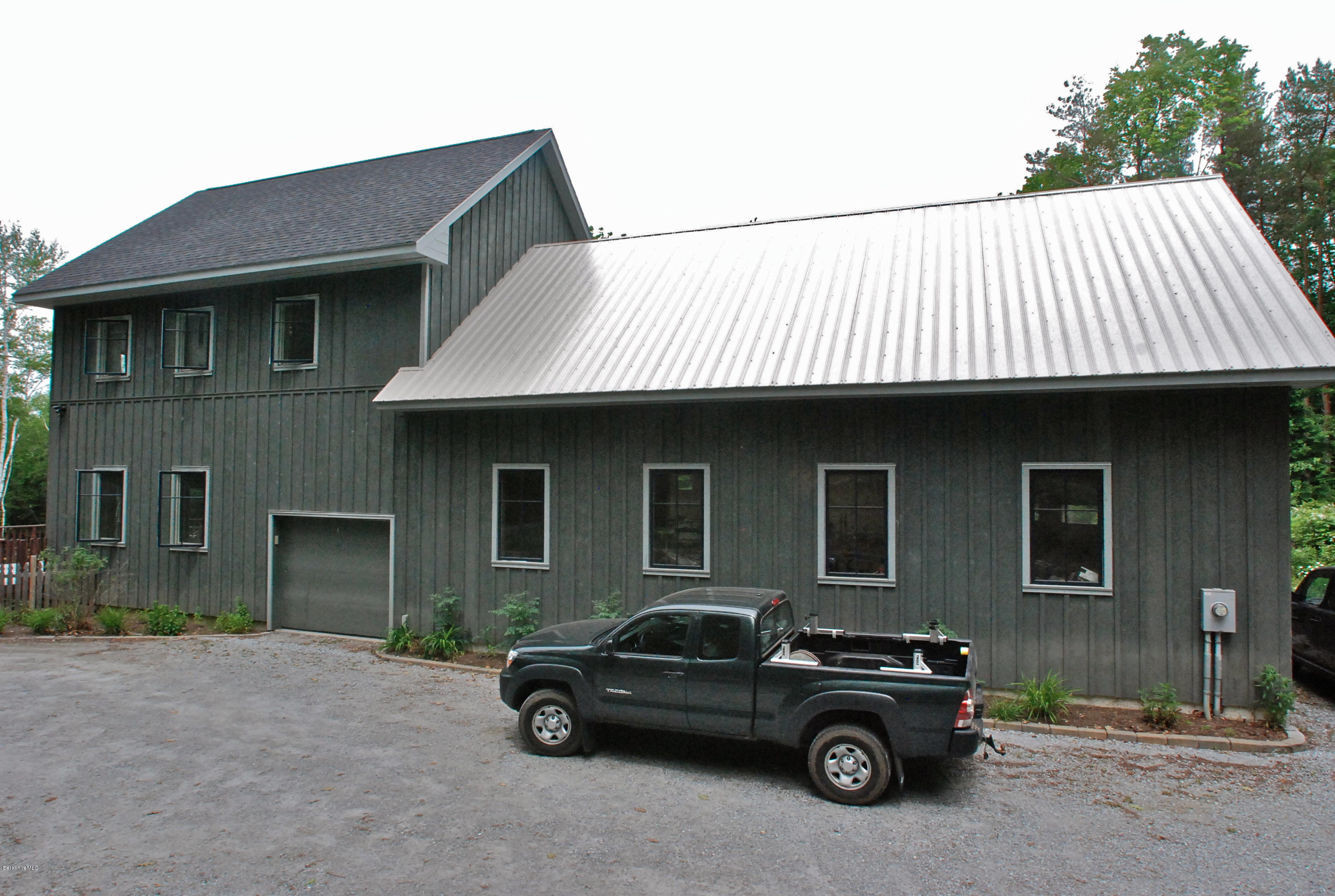 77 Lenox Road West Stockbridge, MA 01266 - Photo 36 of 40 a view of a car park in front of house