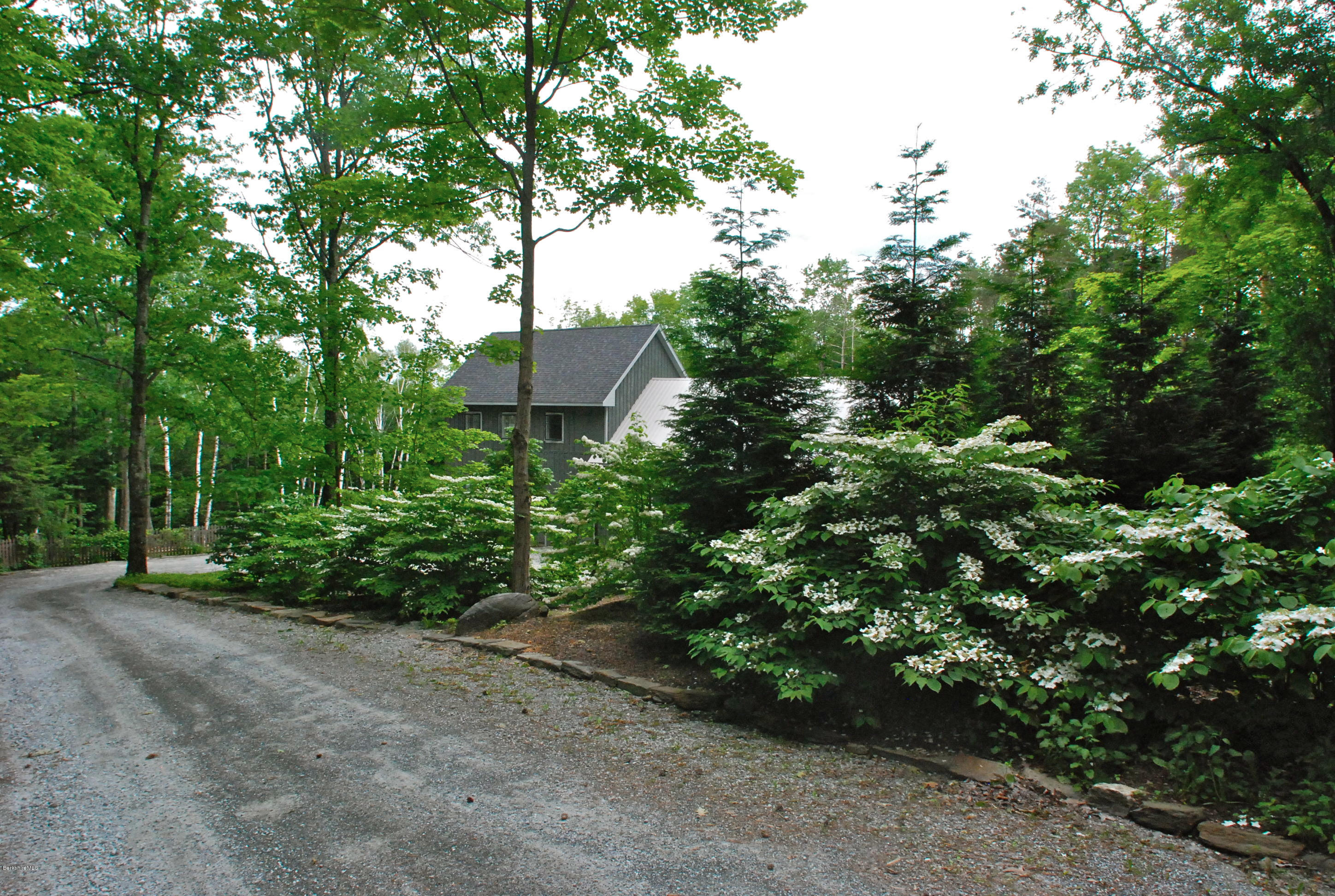 77 Lenox Road West Stockbridge, MA 01266 - Photo 40 of 40 a backyard of a house with lots of green space