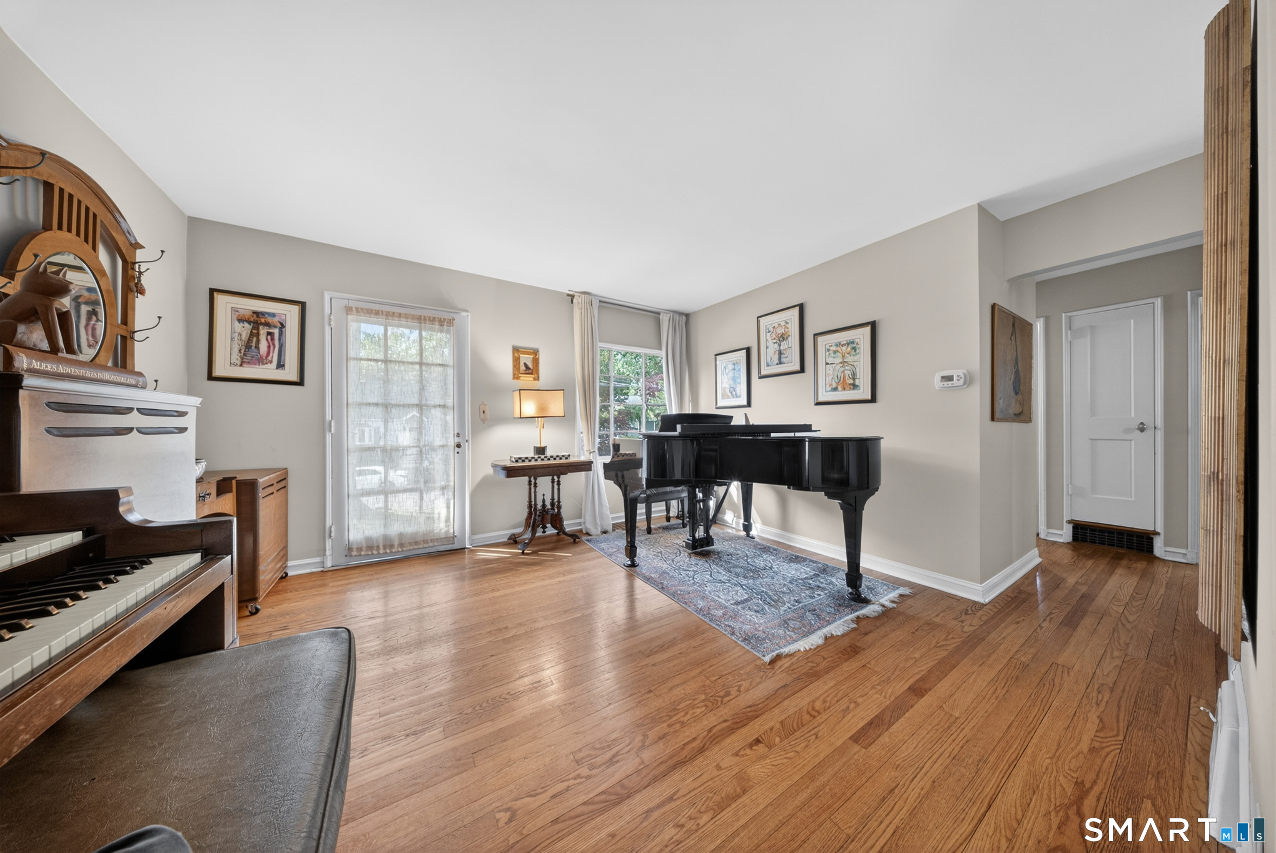 68 Old Elm Road Fairfield, CT 06825 - Photo 6 of 40 a living room with furniture and a wooden floor