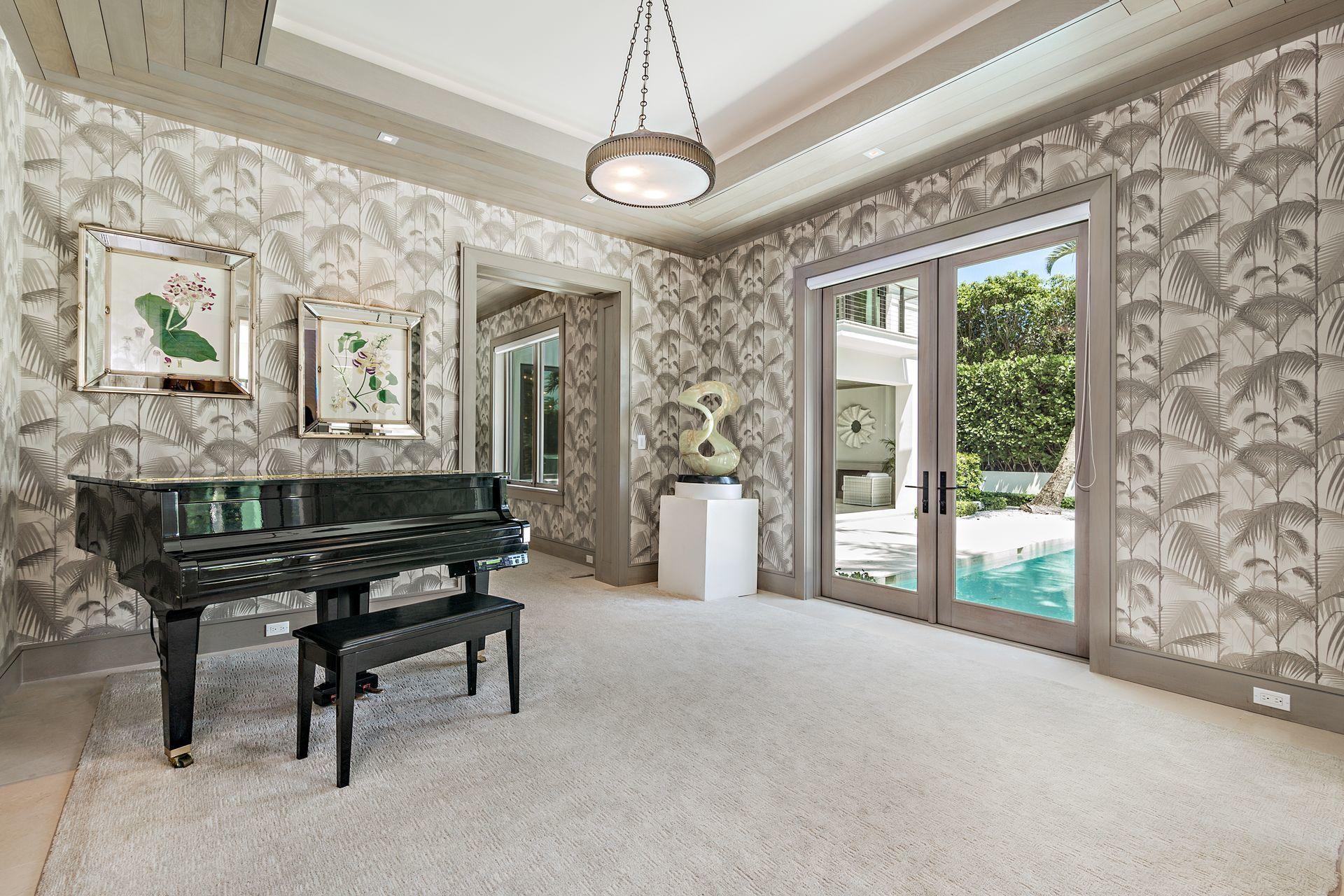 325 Garden Road Palm Beach, FL 33480 - Photo 15 of 57 a living room with furniture and a gate
