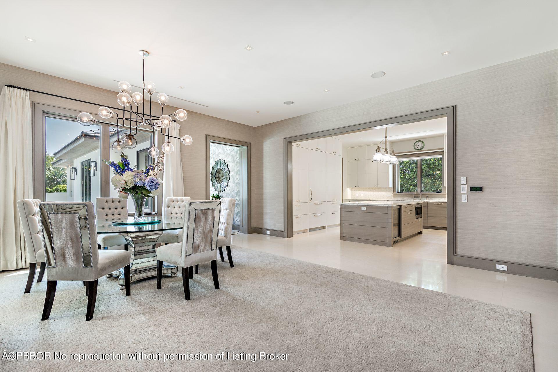 325 Garden Road Palm Beach, FL 33480 - Photo 20 of 57 a view of a dining room with furniture window and outside view