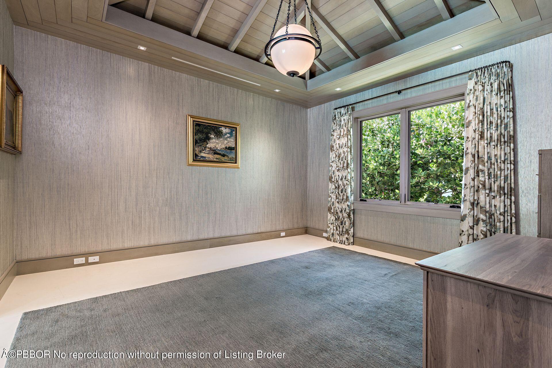 325 Garden Road Palm Beach, FL 33480 - Photo 25 of 57 a view of an empty room with a window