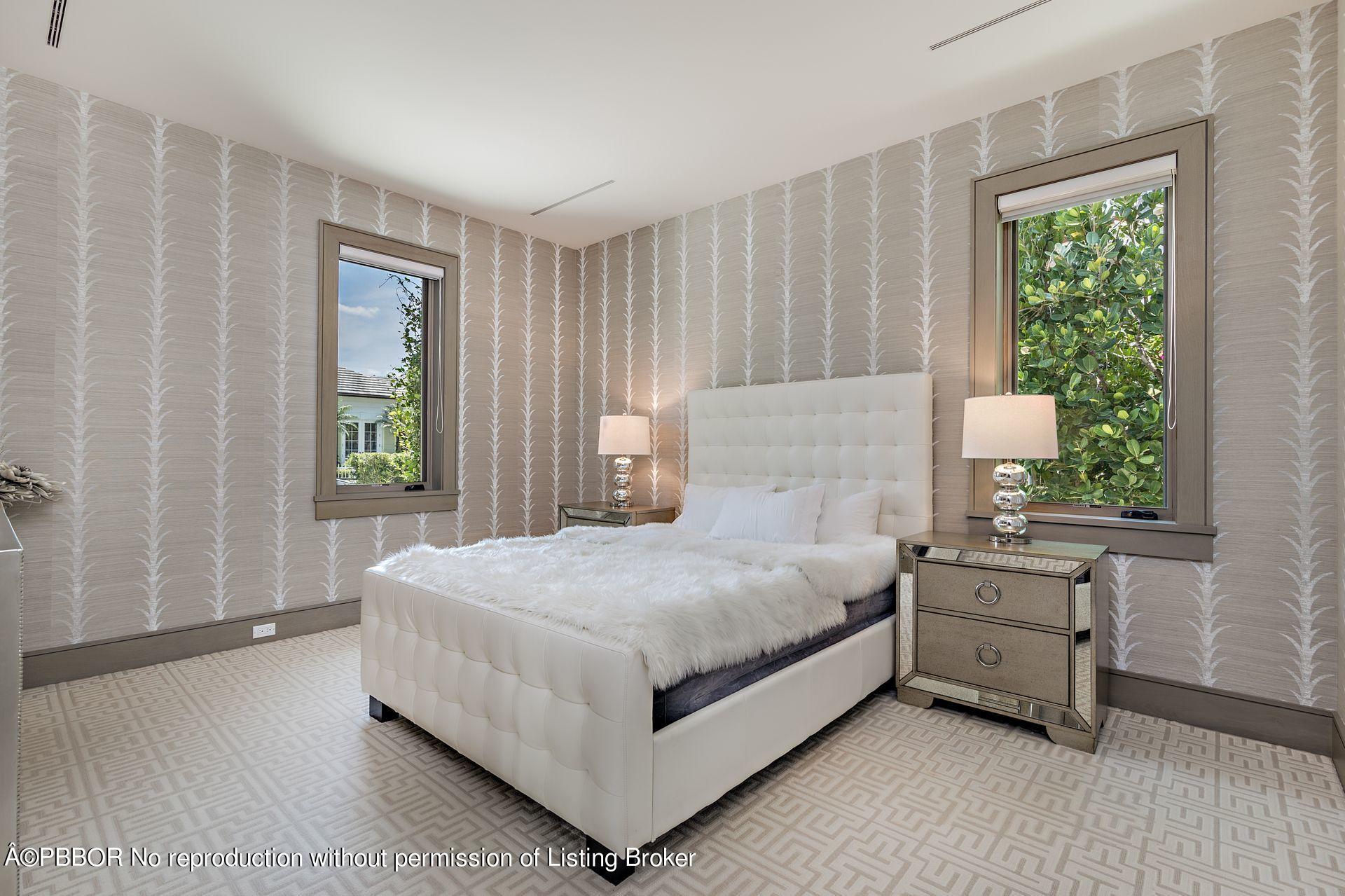 325 Garden Road Palm Beach, FL 33480 - Photo 30 of 57 a bedroom with a bed and a window